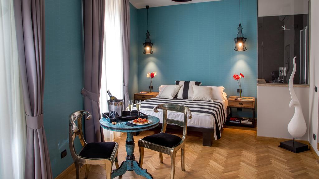Qt Suites Roma Pokoj fotografie