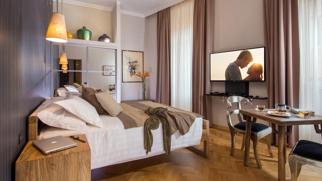 Qt Suites Roma Pokoj fotografie