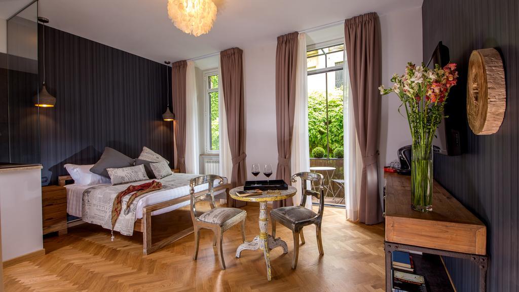 Qt Suites Roma Pokoj fotografie
